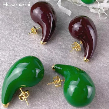 Huanzhi Boucles d'oreilles à goujon à eau creuse à vente à chaud pour femmes multiples couleurs anti-allergiques metal de conception сеи